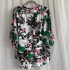 Paradise floral tunic in lightweight polyester.